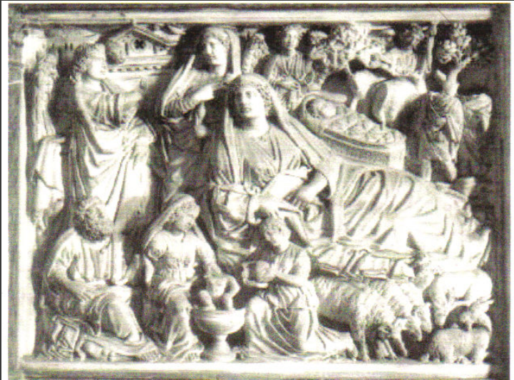 Panel from the Baptistry of Pisa: the Annunciation to Mary (Mary in the center with Gabriel to the top right of her), the Nativity (center-right), the Annunciation to the Shepherds (top and bottom right), and the Bathing of the Christ child (bottom-center left) all together.